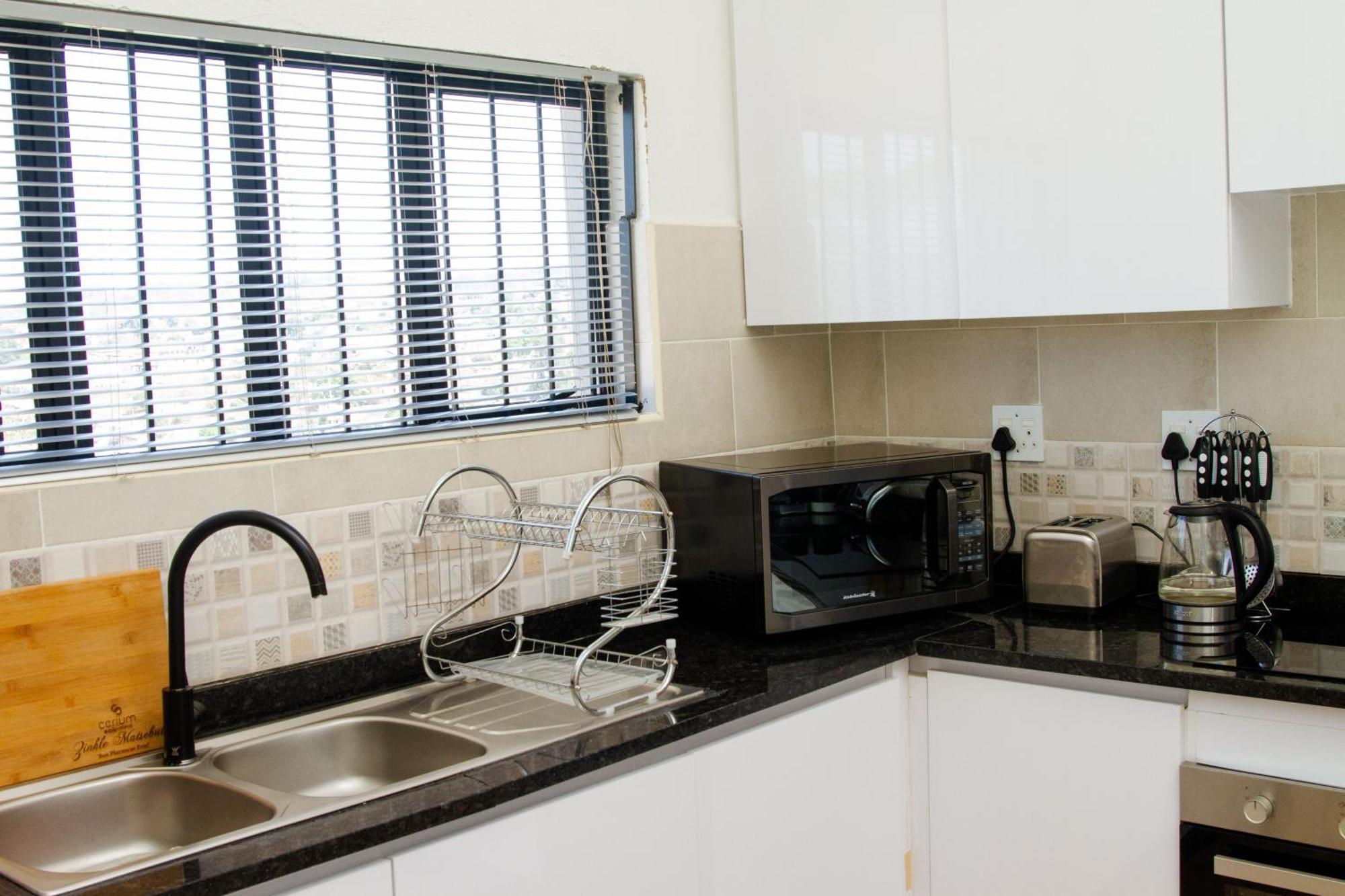 The Ultimate Lotus Apartment Manzini Bagian luar foto